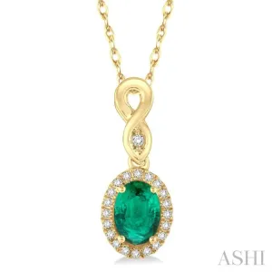 6x4 MM Oval Cut Emerald and 1/10 Ctw Round Cut Diamond Pendant in 10K Yellow Gold with Chain