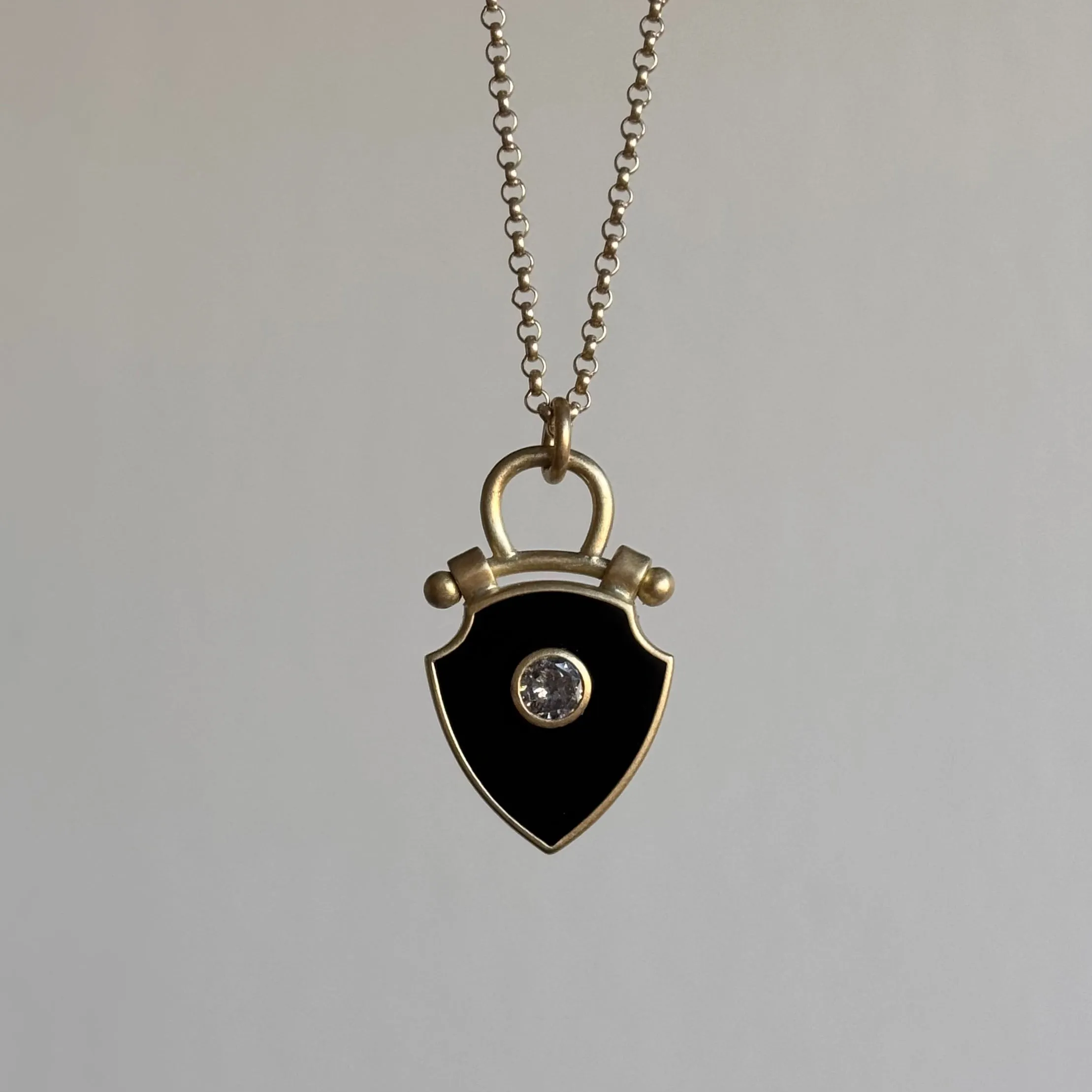 Curved Top Onyx Shield Pendant with Diamond