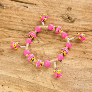 Handcrafted Ceramic Beaded Stretch Bracelet in Pink - Little Pink Pigs | NOVICA