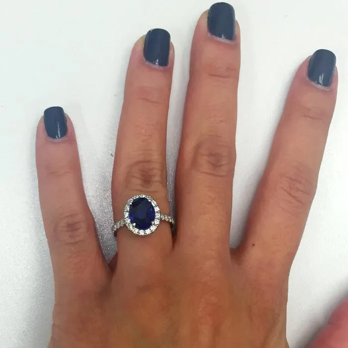 Pave Accented Oval Blue Sapphire Halo