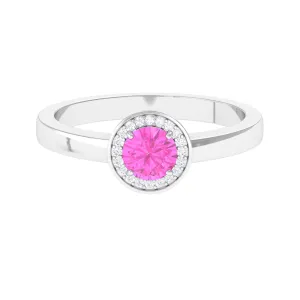 Pink Sapphire and Diamond Halo Engagement Ring